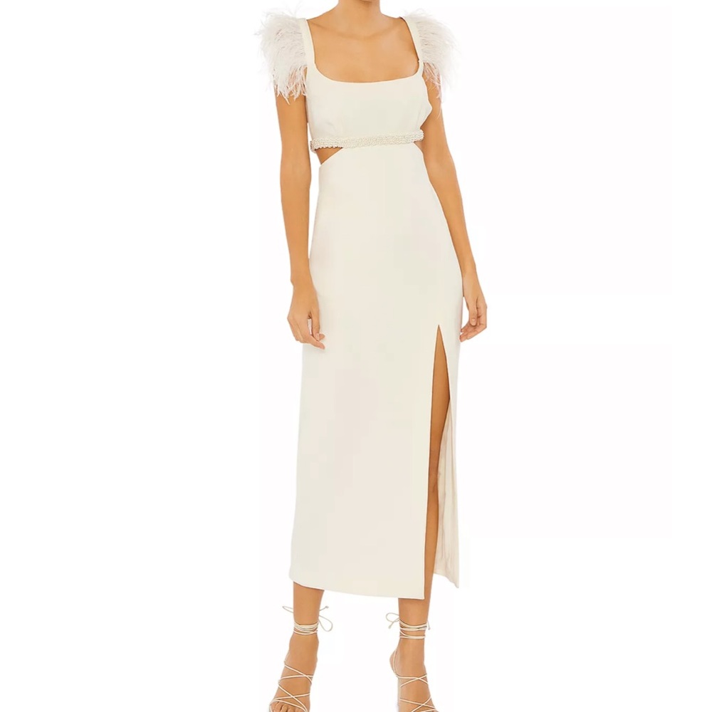 Sleeveless, spaghetti straps with ostrich feather trim
Faux-pearls on waist line